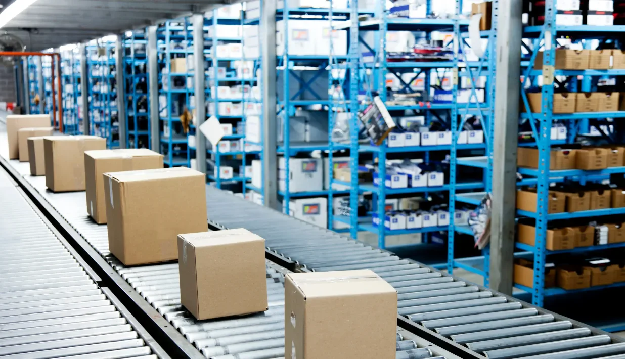 Warehouse conveyor and storage racks illustrating a controlled reader and antenna zone
